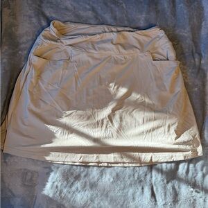 Baleaf Neutral Cream Women's Athletic Tennis Skirt, size Large